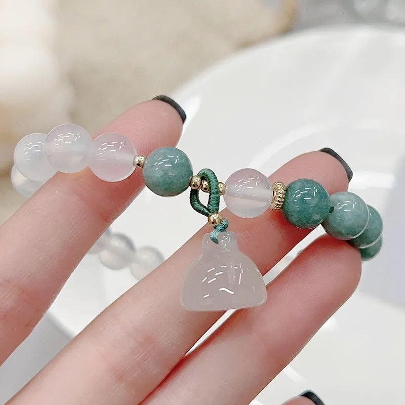 Women's retro Chinese style agate bracelet with lotus seedpod design and handmade craftsmanship