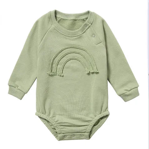 Long sleeve baby romper in waffle cotton fabric, shown in beige with cotton rope tie closure.