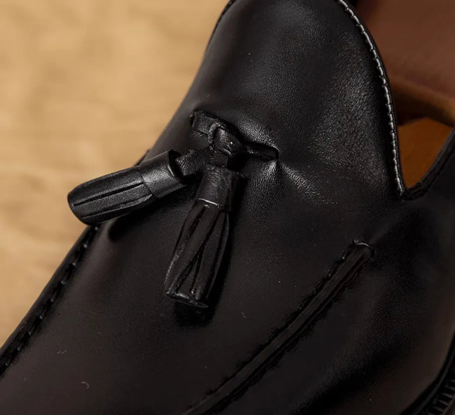 Men's black genuine leather fringed slip-on loafers with rubber soles and British styling