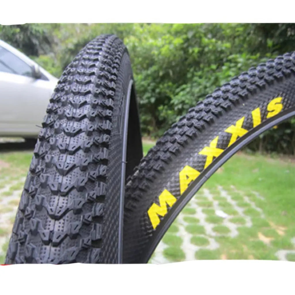 Mountain bike tyre showing tread pattern and sidewall with size markings