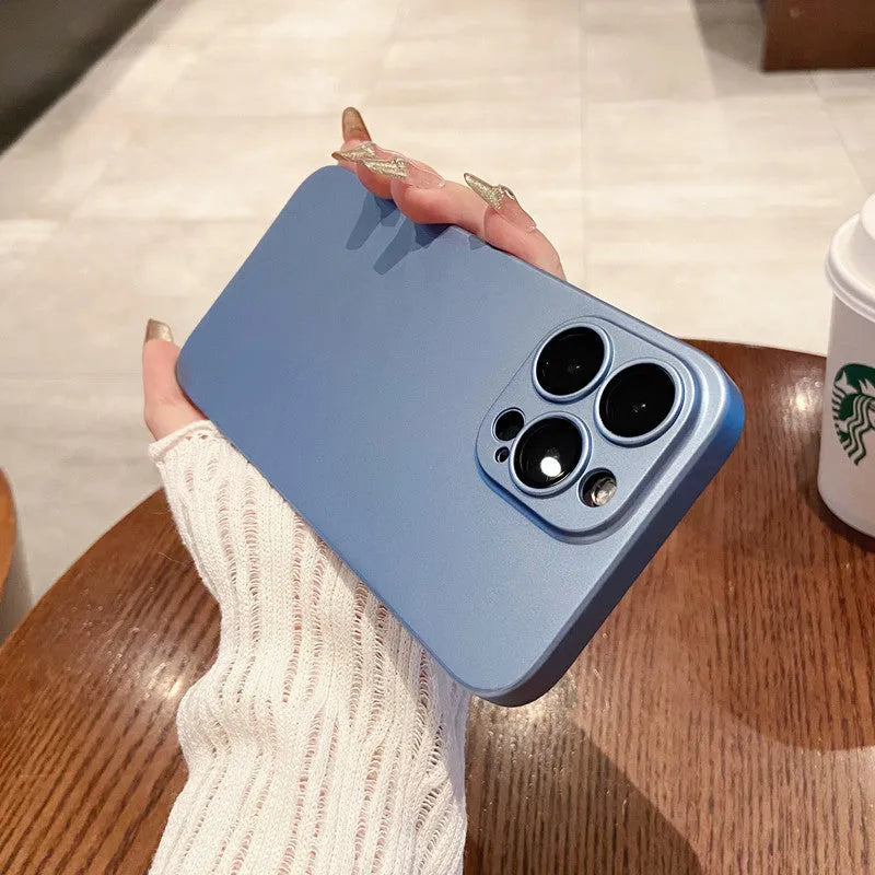 Ultra-thin frosted PC phone case with all-inclusive lens cover, available in green, grey, or purple for iPhone models.