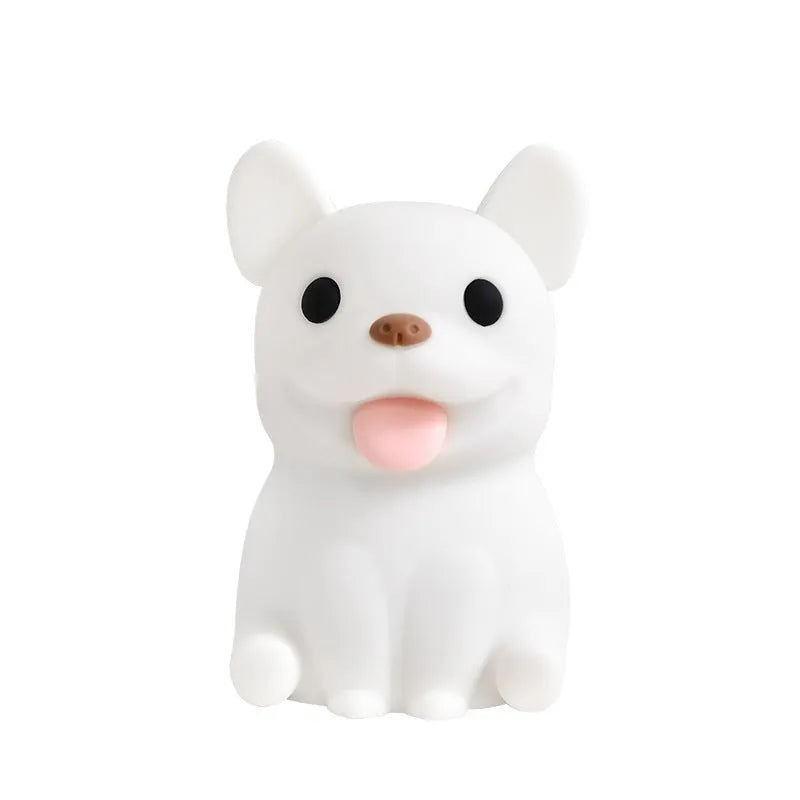 Silicone cartoon bull night light with USB port for charging and dimming controls.