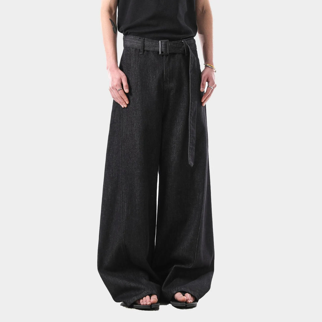 Black high waist straight leg jeans with zip placket fly, shown on model demonstrating fit and silhouette