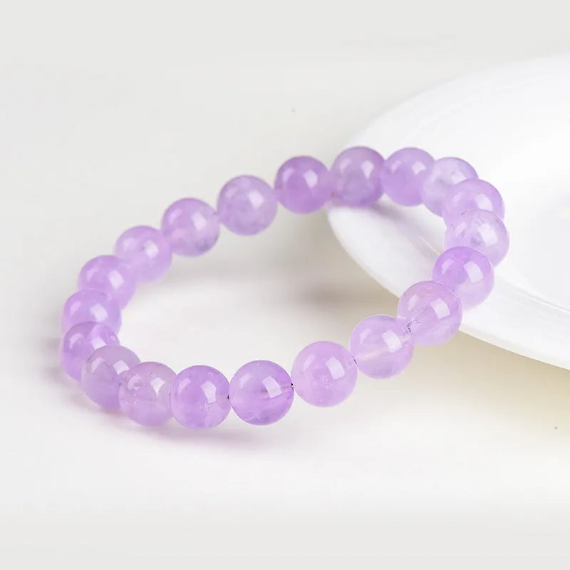 Lavender amethyst geometric bracelet with water ripple design showing nine bead size options from 6-6.8mm to 17-17.8mm diameters