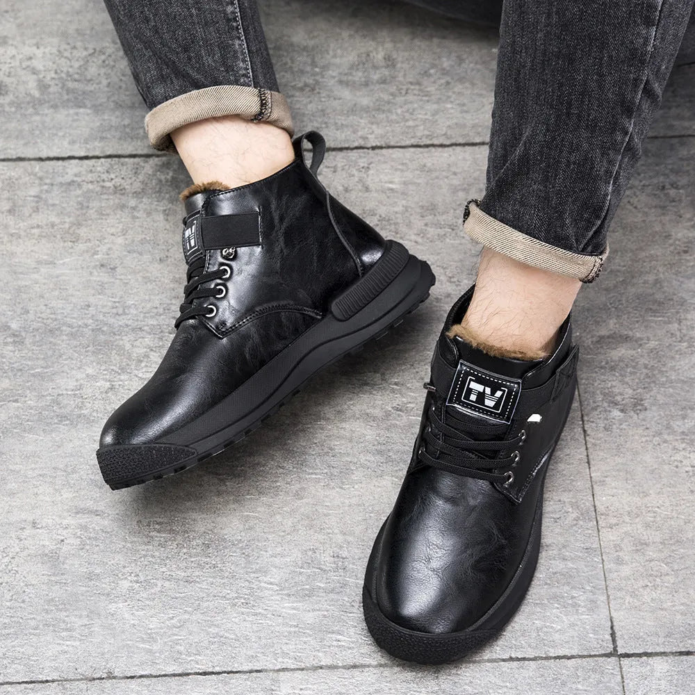 Black Martin high-top platform boots with velvet accents and a thick rubber sole on a neutral background