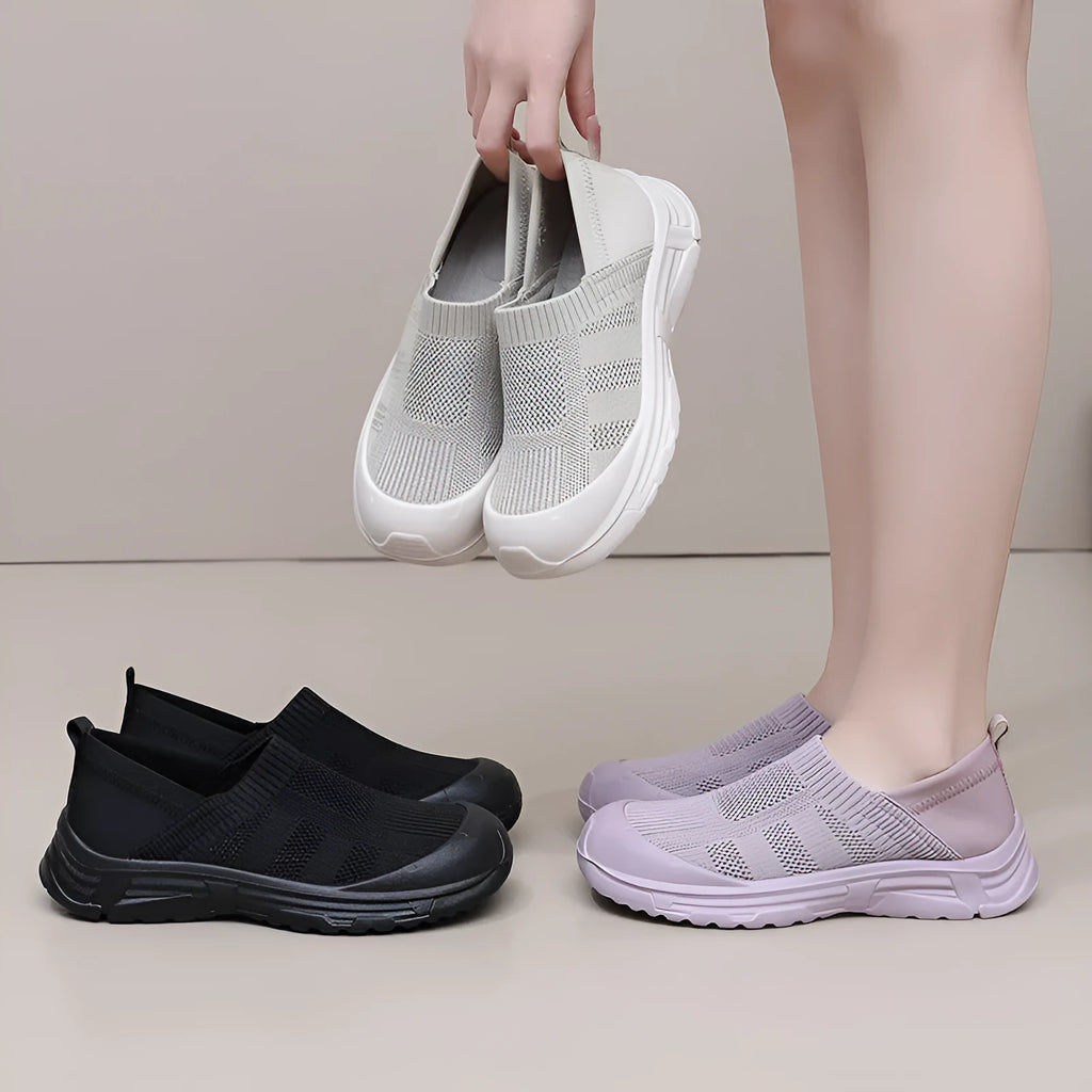Women's black one pedal slip-on shoes with cloth upper and flat PVC sole