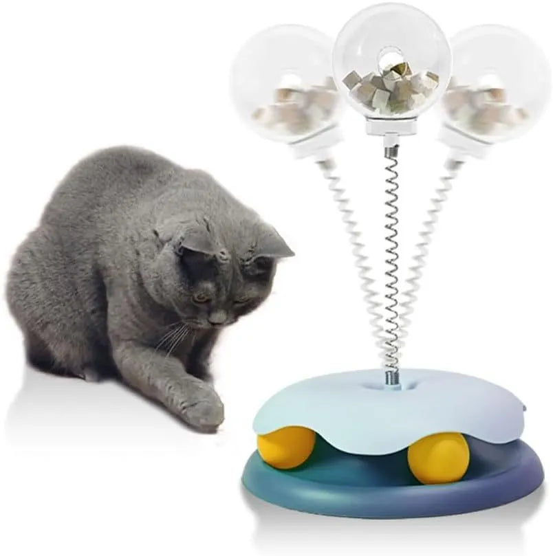 Blue and green cat treat dispenser toy with track ball, measuring 21.5cm by 32cm