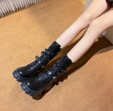 Women's black mid-calf knight boots with metal buckle and side zipper, round toe design on viscose sole