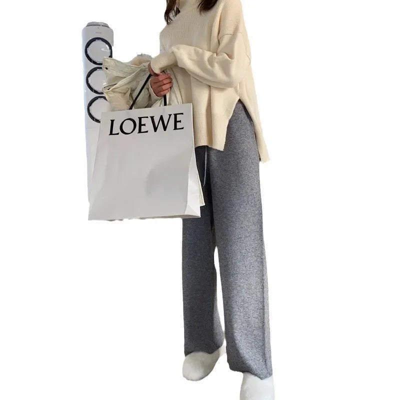 Women's high-waist wide-leg knitted trousers in black with straight-leg design and 95cm length