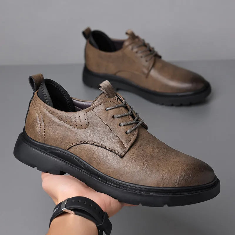Men's black and brown leather business shoes with rubber soles and sewing line detail