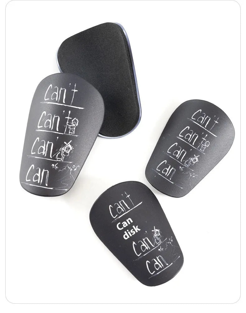 Pair of football shin guards in black colour showing front protective design