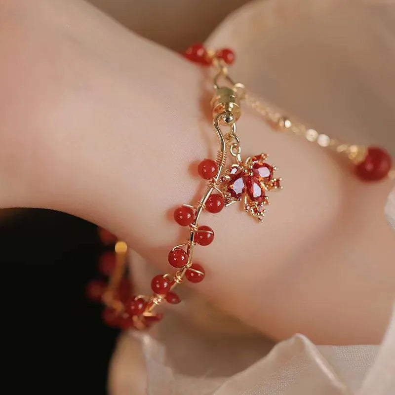 Red electroplated alloy bracelet with Chinese style maple leaf design and magnetic closure for girls