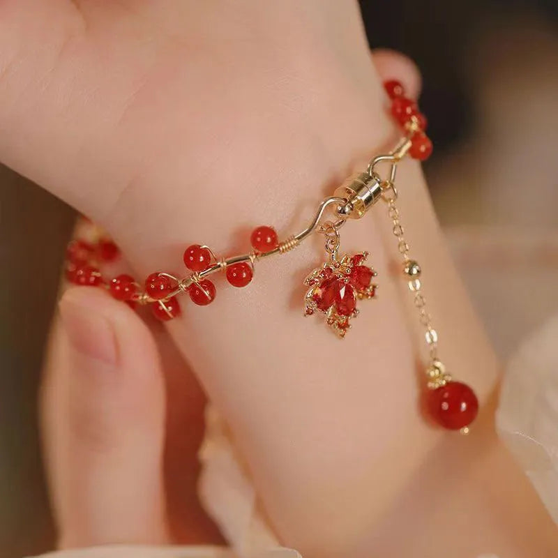 Red electroplated alloy bracelet with Chinese style maple leaf design and magnetic closure for girls