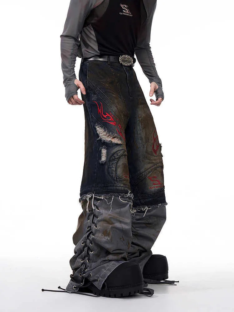 Men's retro wide-leg jeans with detachable trouser legs showing convertible feature and mid-high waist design