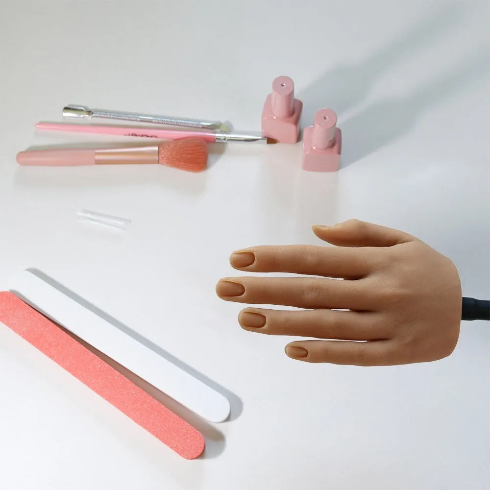 Silicone nail art practice hand model showing articulated fingers for manicure training.