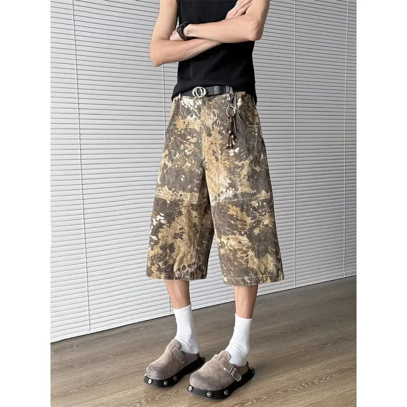 Yellow snake pattern camouflage cropped denim jeans on size chart showing S to 3XL options