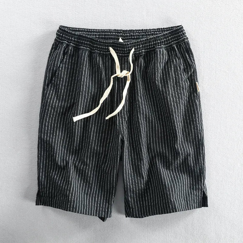 Men's striped casual shorts in light blue with elastic waistband, loose straight cut, cotton fabric
