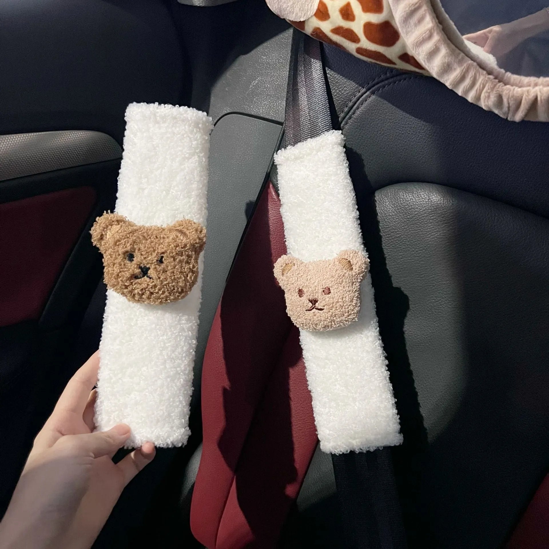 Cartoon bear design plush car seat belt protective cover for infant safety, showing khaki and coffee colour options