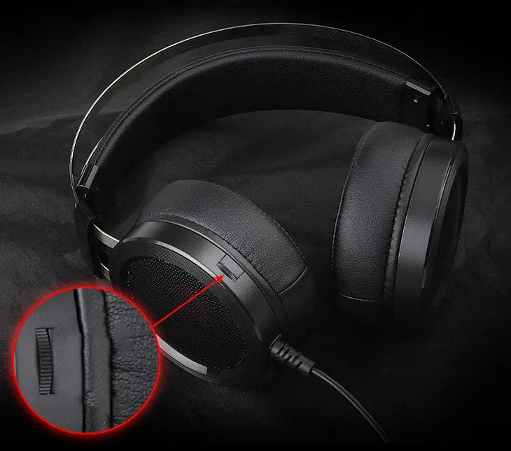 Black wired gaming headset with 2-metre cable and 3.5mm audio connector on a desk