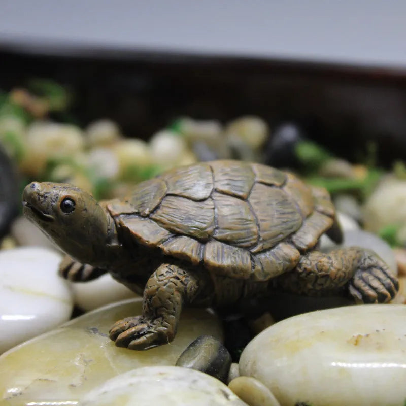 Handcrafted resin turtle garden ornament measuring 8cm long with realistic texture and pastoral style