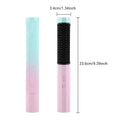 Pink wireless straightening comb with USB charging port and temperature buttons