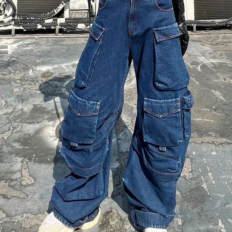Dark blue distressed wide-leg women's jeans with a high waist and multiple pockets on a mannequin.