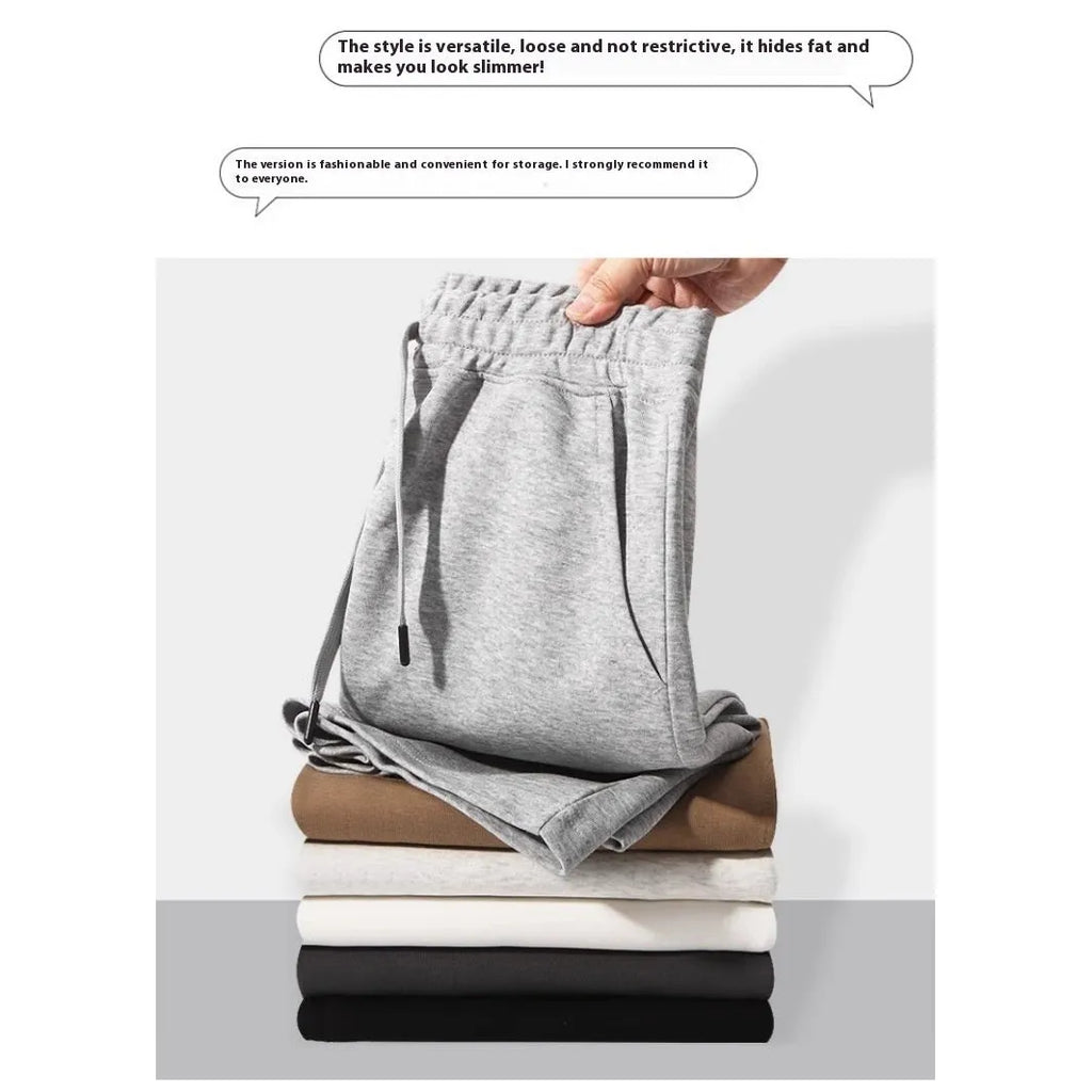 Straight-leg cotton sports shorts in light grey on a mannequin, showing the casual fit.