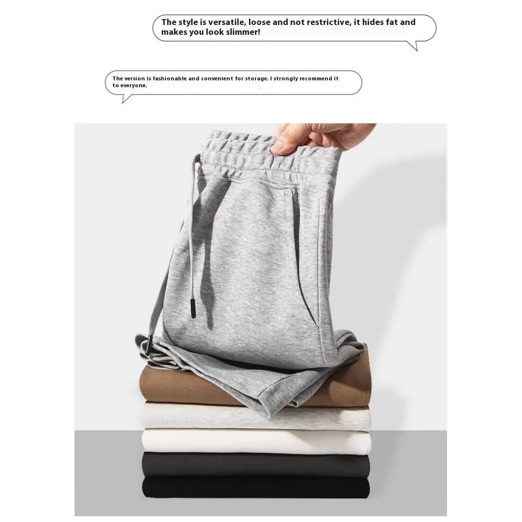 Straight-leg cotton sports shorts in light grey on a mannequin, showing the casual fit.