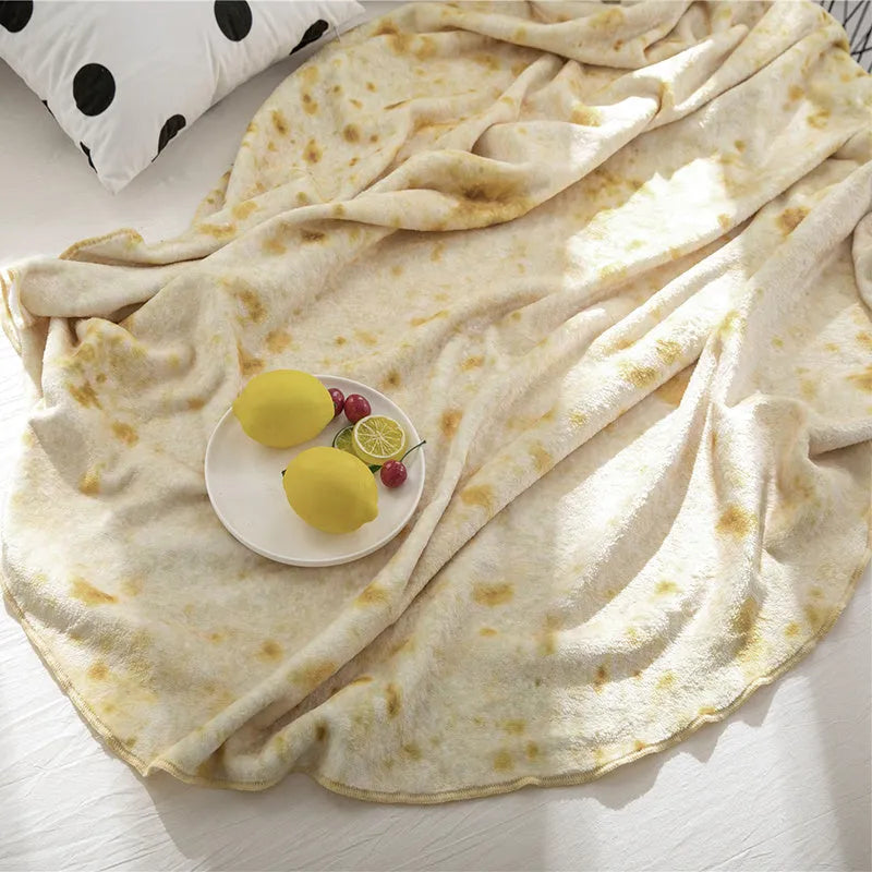 Flannel burrito blanket with food-themed print, showing soft microfiber fleece texture and round or rectangular shape options