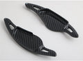 Car steering wheel paddle shifter modification in carbon fibre black finish on ABS plastic