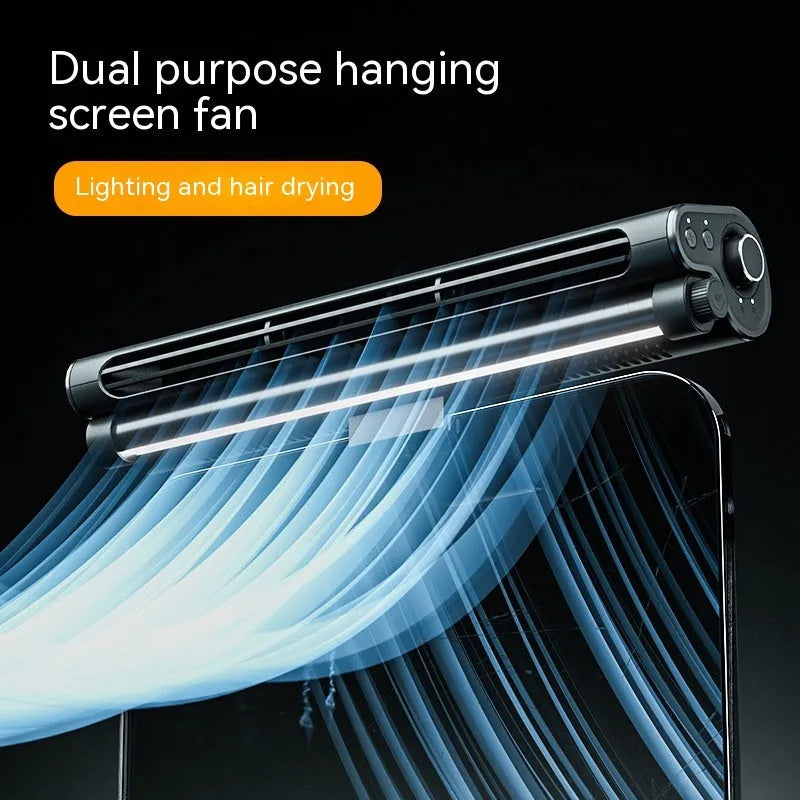 Black bladeless fan with lighting lamp attached to laptop screen showing USB connection and screen clamping mechanism