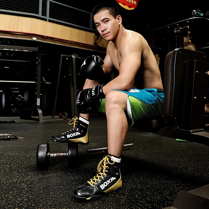 High-top combat training wrestling shoes with mesh and leather upper in green colour.