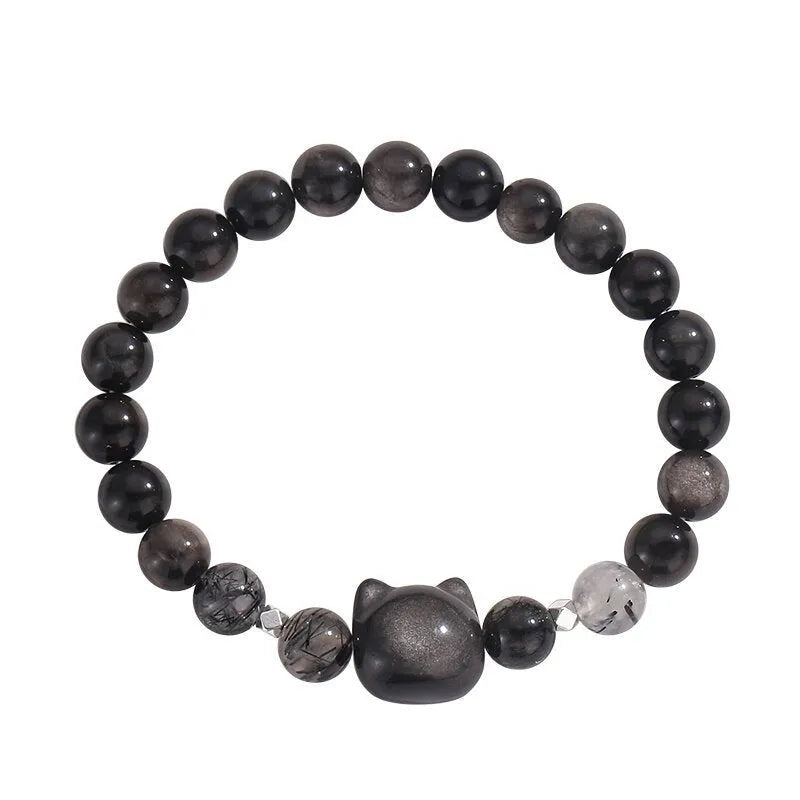 Adjustable obsidian cat bracelet with electroplated silver finish and detailed animal modelling