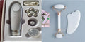 White jade facial roller with double-headed design and optional gua sha board on wooden surface