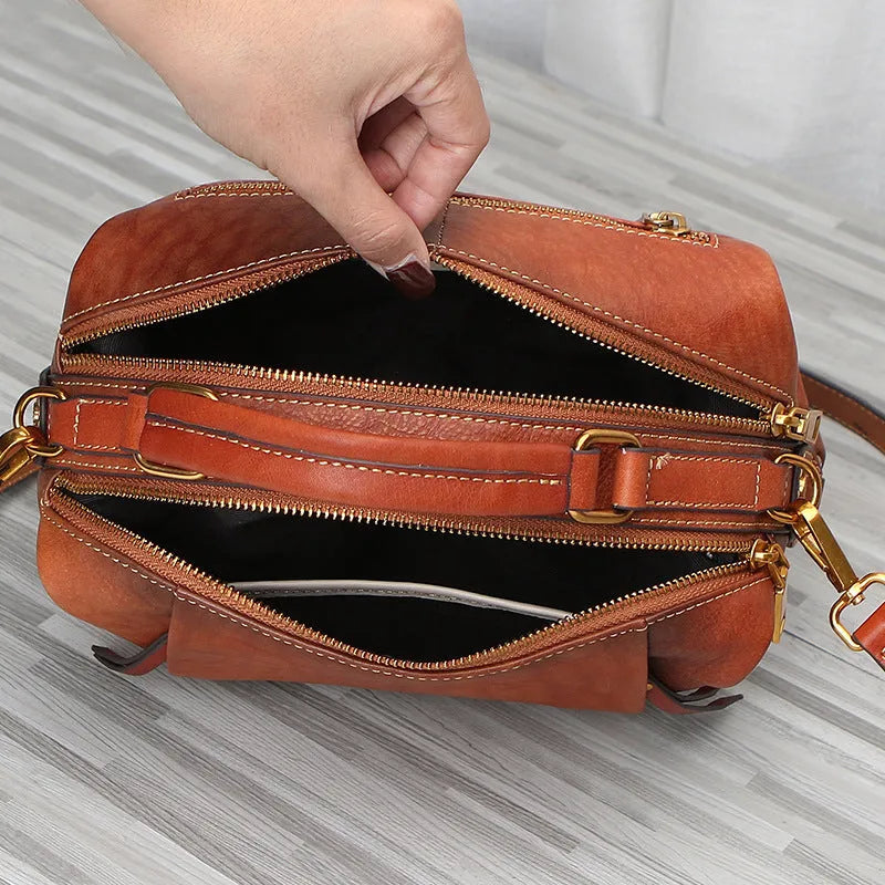 Genuine leather women's shoulder bag in pillow shape with open pocket, available in brown, coffee, grey and green
