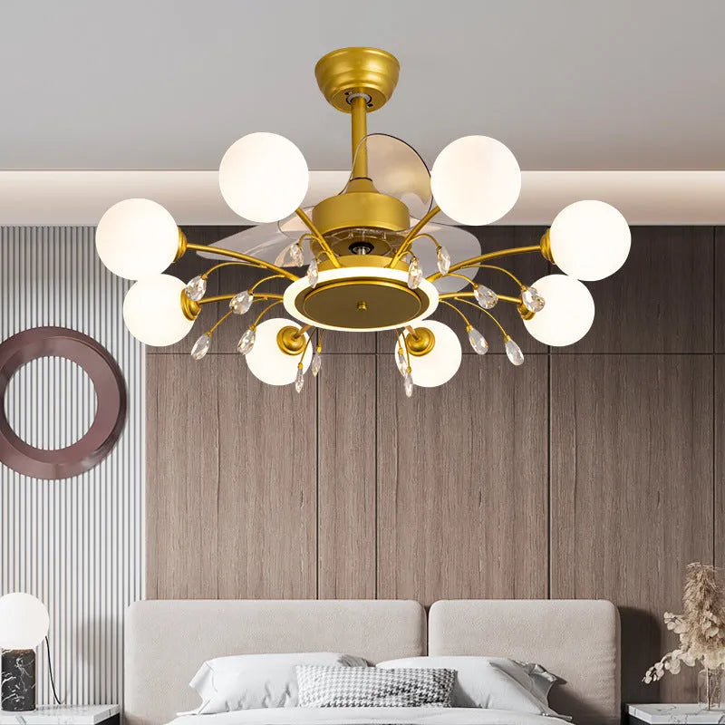 Gold ceiling fan lamp with metal blades and acrylic lampshade, showing remote control for tri-colour lighting and airflow adjustment