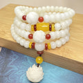 White jade Bodhi stone 108-bead bracelet in three style options with different bead sizes on a wrist.