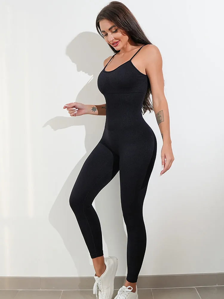 Women's black unitard jumpsuit with spaghetti straps and tummy control, made from nylon and spandex for stretch