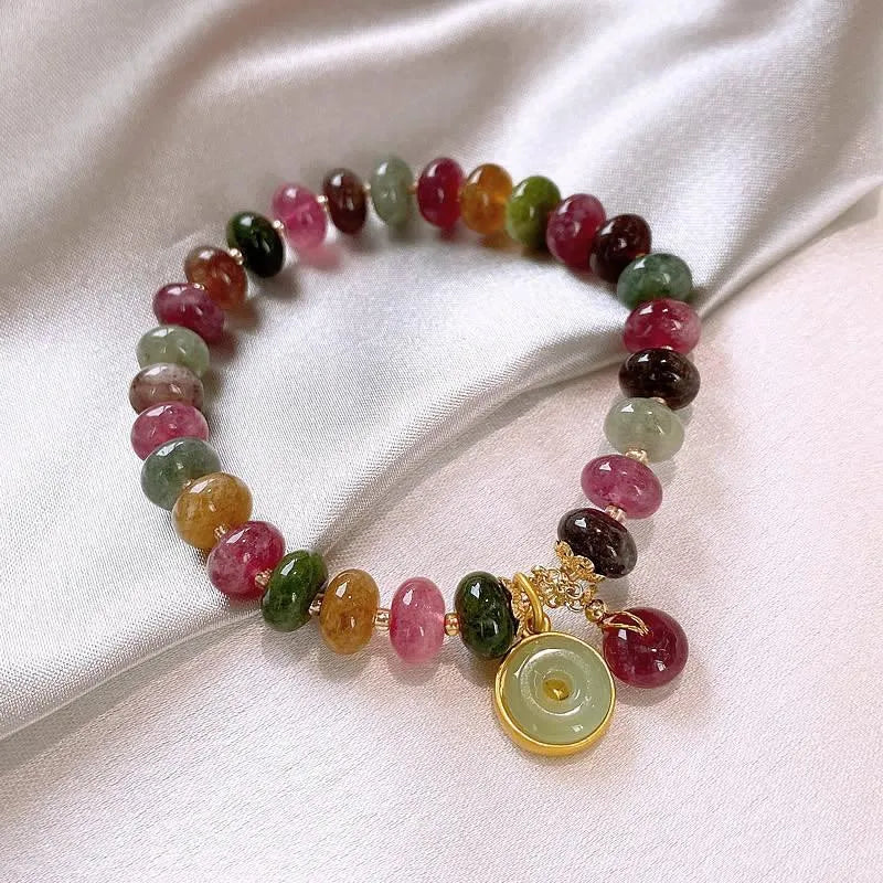 Colourful tourmaline abacus bead bracelet with rabbit pendant on natural stone beads