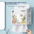 Roll of 100 disposable, soft face cloths with a hanging hook, made from viscose and polyester.