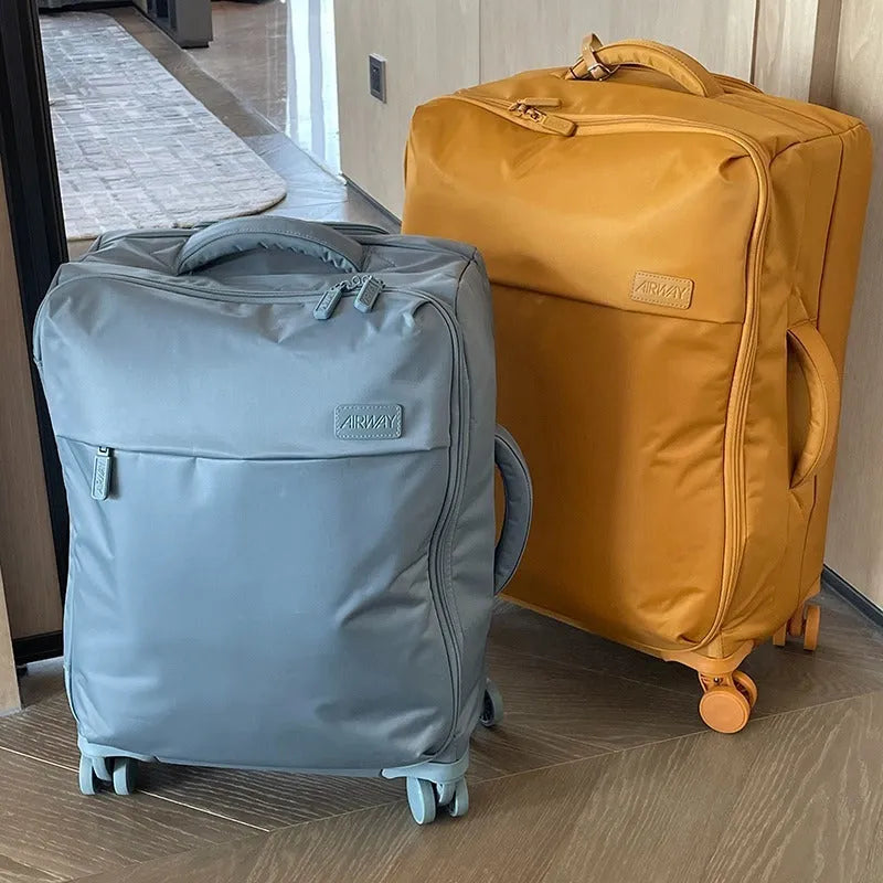 Ultra-light waterproof Oxford cloth suitcase in bluestone green with universal wheels and antimicrobial lining