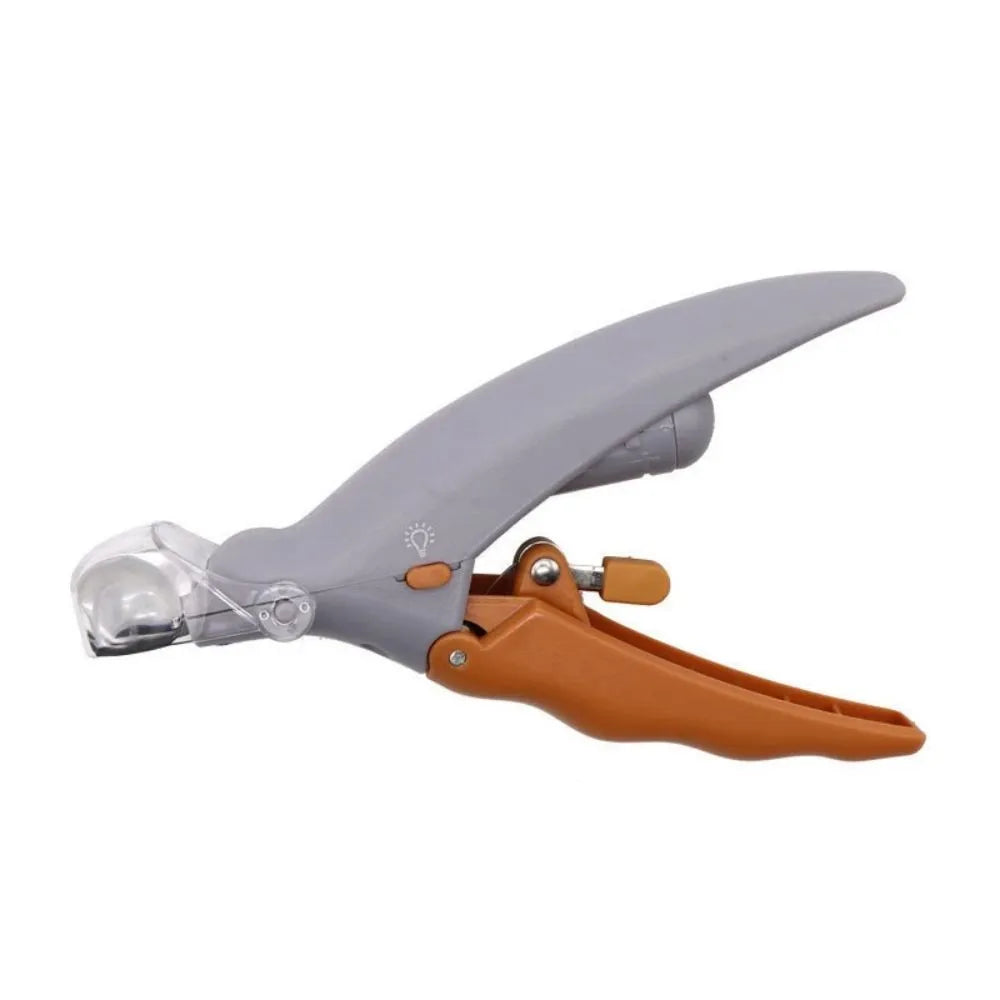 Yellow pet nail clipper with LED light on, magnifying lens, and safety guard for dogs and cats