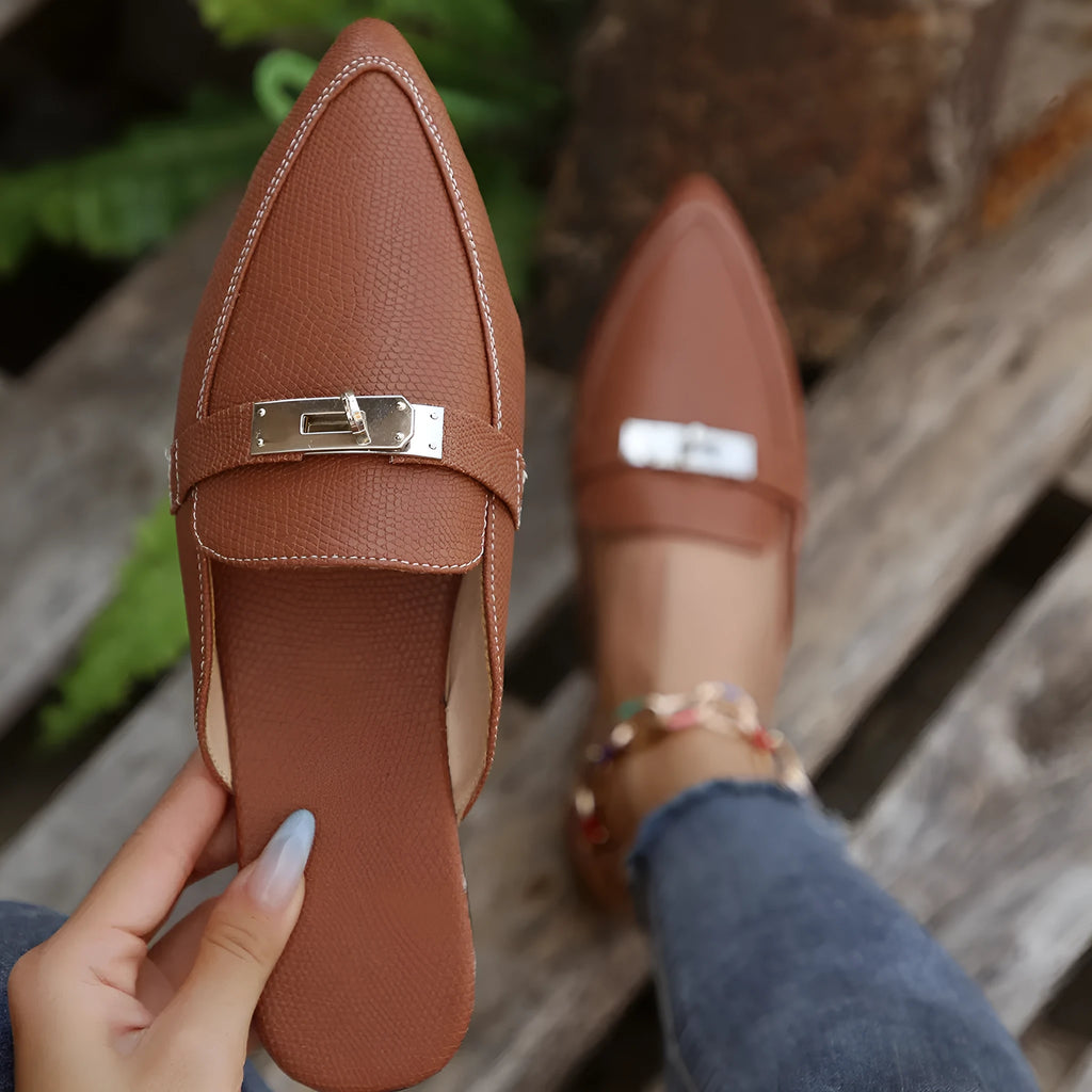 Light brown women's pointed-toe semi-slippers with a low heel and rubber sole.