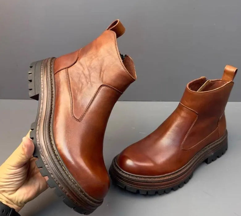 Men's Chelsea boots in black or brown with first layer cowhide vamp lining, zip closure and thick bottom heel, sizes 38-44