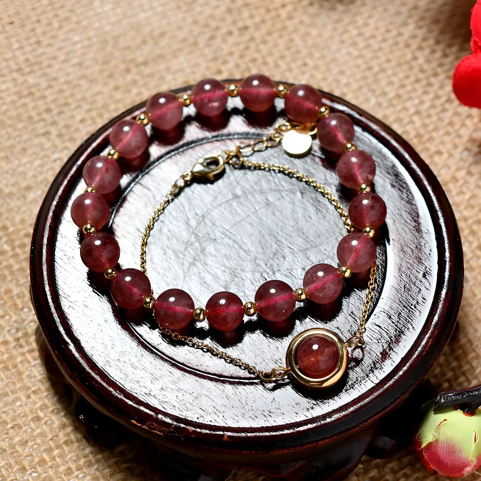 Women's double-layer copper bracelet with gold plating, strawberry quartz crystals, and lucky beads.