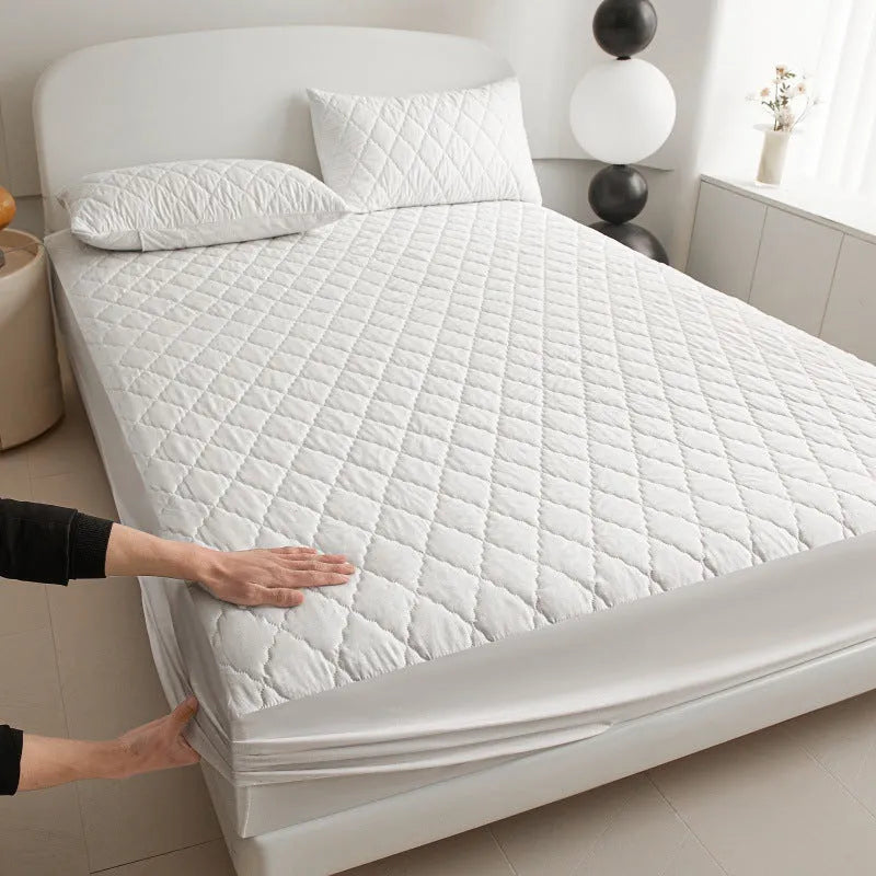 Diamond lattice quilted waterproof mattress protector set in black, grey, pink, or white with bamboo fibre material and fitted sheet sizes.