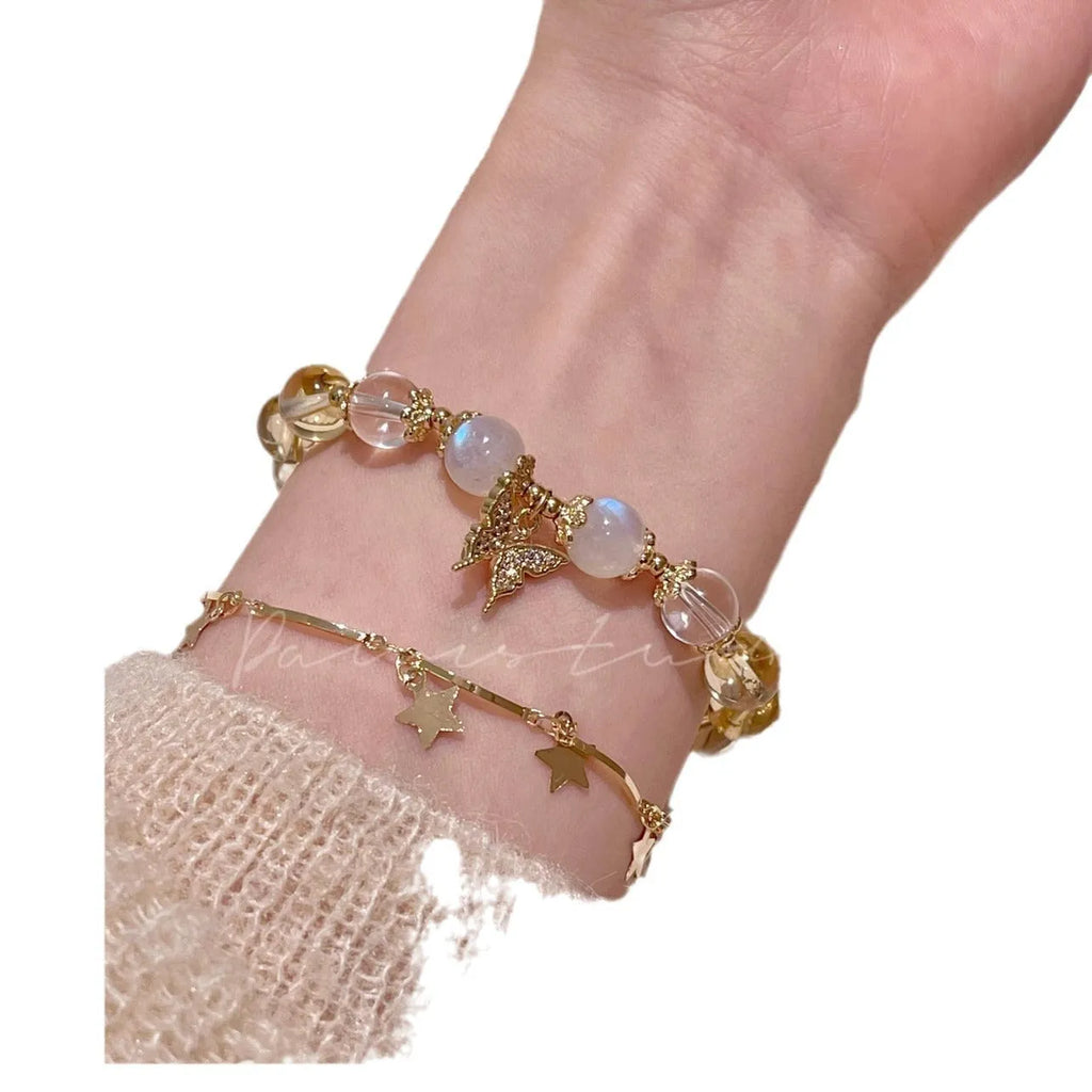 Moonstone white crystal bracelet with diamond-shaped beads and citrine butterfly charm in Chinese style design