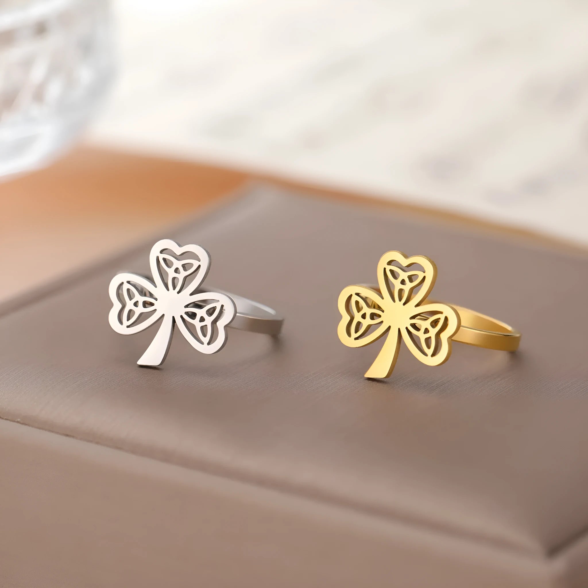 Stainless steel hollow ring with electroplated finish in gold or steel colour on hand