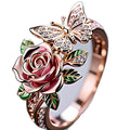 Adjustable fairy-style alloy ring with dripping oil treatment showing butterfly and floral motifs
