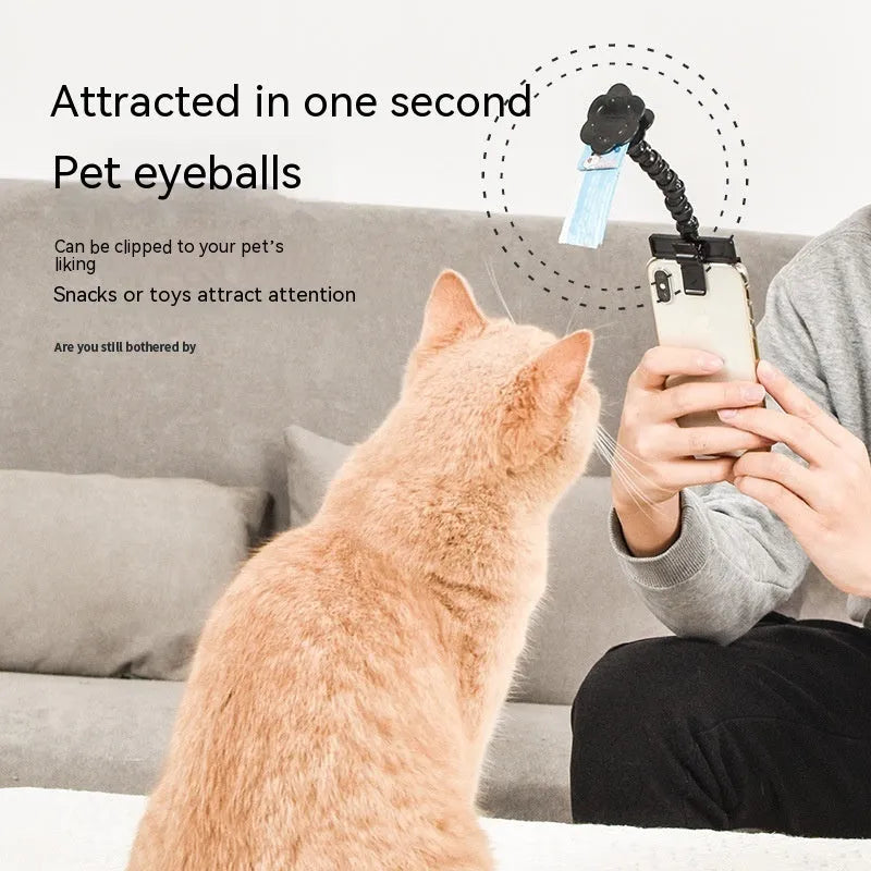 Black pet photography tool with rotating clip and snack holder for mobile phone cameras